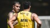 Reinier e Hulk, durante treino do Atlético na Cidade do Galo