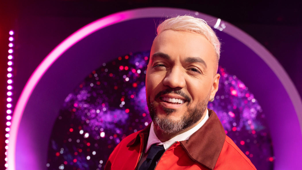 Belo durante o 'The Masked Singer' na Globo